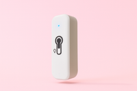 Cpateur de temperature connecté sur fond rose