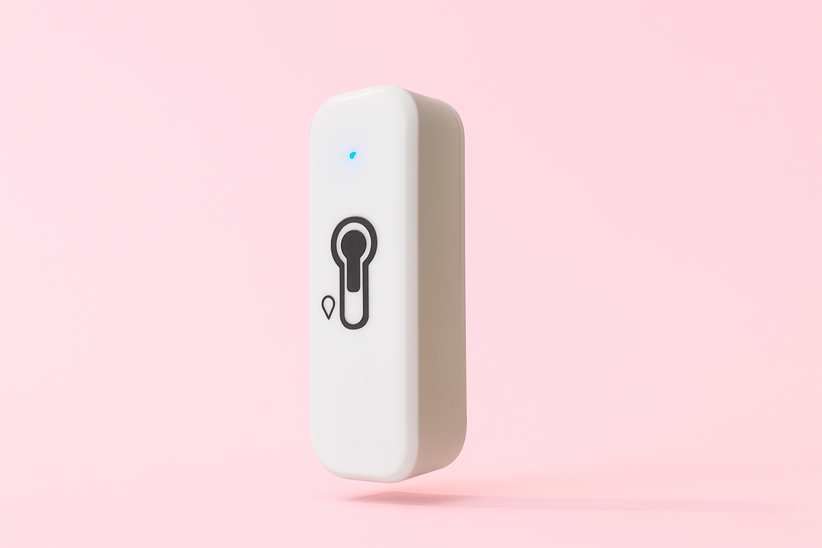 Cpateur de temperature connecté sur fond rose