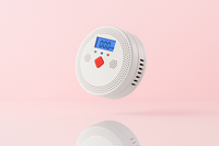 detecteur de gaz sur fond rosé